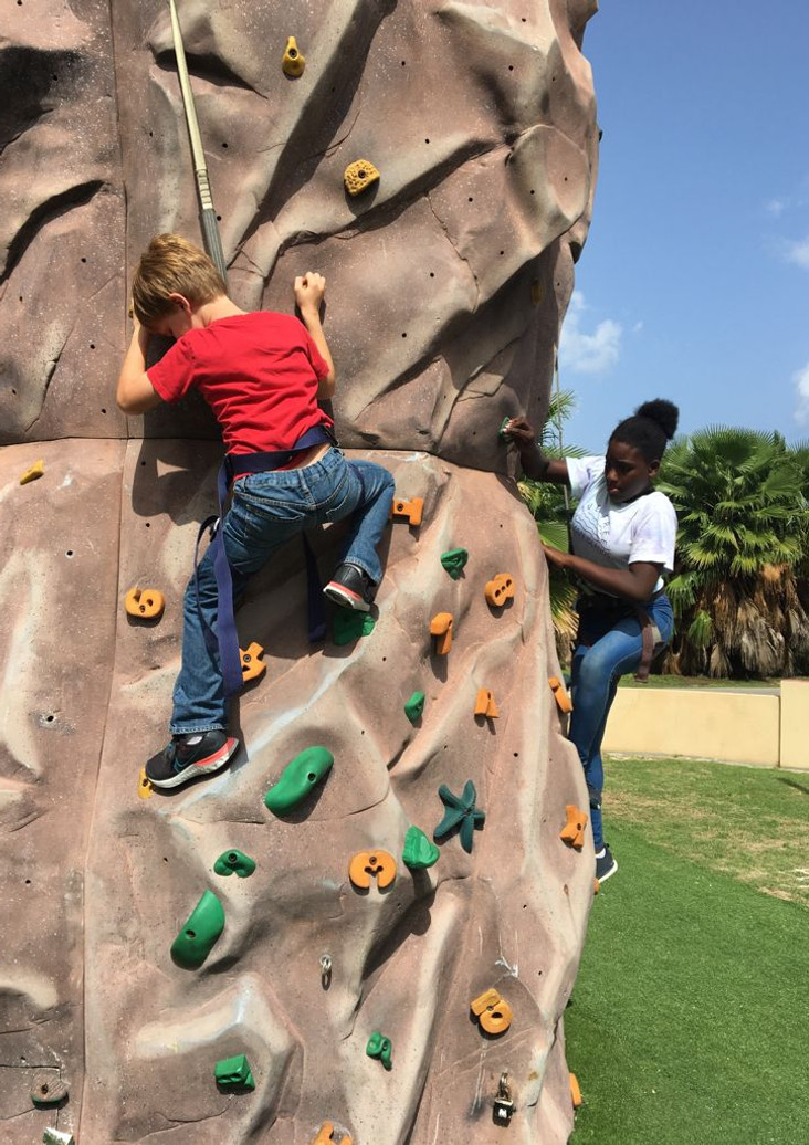 A camper on the climbing tower